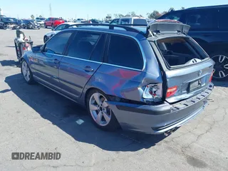 2003 BMW 3 Series 325i with VIN WBAEN33443PC11690, listed as a IAAI auction lot 41939082 with 159,123 mi miles. Bid and sale history available at carsss.com. Image 3.