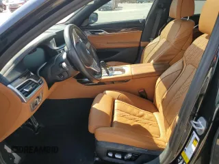 2022 BMW 7 Series 750i xDrive with VIN WBA7U2C01NCK83702, listed as a Copart auction lot 74327704 with Not provided miles and Salvage title. Bid and sale history available at DreamBid. Image 7.
