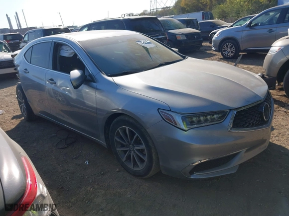 2019 Acura TLX with VIN 19UUB1F3XKA009385, listed as a IAAI auction lot 40584274 with 61,376 mi miles. Bid and sale history available at carsss.com. Image 1.