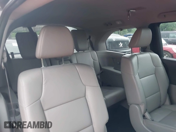 2016 Honda Odyssey Touring Elite with VIN 5FNRL5H96GB063176, listed as a IAAI auction lot 42157604 with 106,177 mi miles. Bid and sale history available at carsss.com. Image 18.