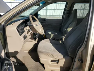 2001 Ford Windstar z VIN 2FMZA554X1BB51324, wystawiony jako Copart lot #56855195 z przebiegiem 156 324 mil mil oraz Szkody całkowita. Historia ofert i sprzedaży dostępna na DreamBid. Obrazek 7.