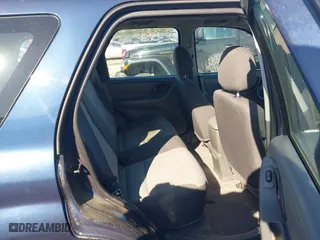 2003 Ford Escape XLS Popular with VIN 1FMYU02133KA02990, listed as a IAAI auction lot 41803174 with 140,792 mi miles. Bid and sale history available at carsss.com. Image 8.