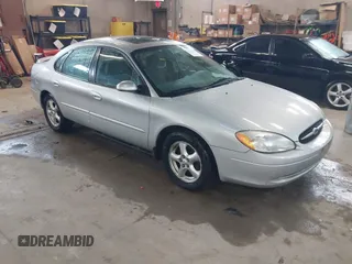 2003 Ford Taurus SES Standard with VIN 1FAFP55U13G222465, listed as a IAAI auction lot 42168336 with 128,078 mi miles. Bid and sale history available at carsss.com. Image 1.