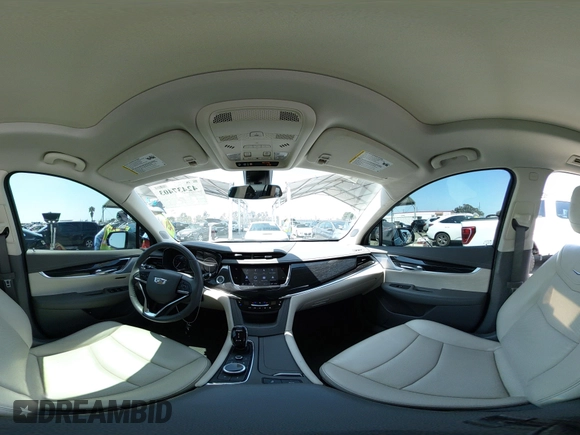 2023 Cadillac XT6 FWD Premium Luxury with VIN 1GYKPCRS6PZ163018, listed as a IAAI auction lot 42437403 with 21,366 mi miles and . Bid and sale history available at DreamBid. Image 19.
