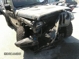2022 Jeep Wrangler Unlimited Rubicon with VIN 1C4JJXR60NW182756, listed as a IAAI auction lot 36927414 with Not provided miles and . Bid and sale history available at DreamBid. Image 6.