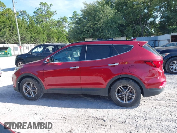2017 Hyundai Santa Fe 2.4L with VIN 5XYZUDLBXHG397691, listed as a IAAI auction lot 42687035 with 115,563 mi miles and . Bid and sale history available at DreamBid. Image 14.