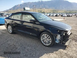 2014 Volkswagen Jetta TDI w/Premium with VIN 3VWLL7AJ2EM363857, listed as a Copart auction lot 54721665 with 134,225 mi miles and Salvage title. Bid and sale history available at DreamBid. Image 4.