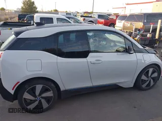 2015 BMW i3 z VIN WBY1Z4C52FV503063, wystawiony jako IAAI lot #40644359 z przebiegiem 77 009 mil mil oraz . Historia ofert i sprzedaży dostępna na DreamBid. Obrazek 13.