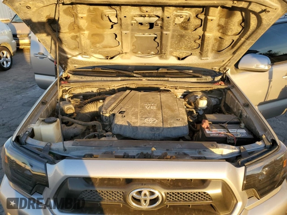 2014 Toyota Tacoma PreRunner with VIN 3TMKU4HNXEM041311, listed as a Copart auction lot 84065684 with 212,473 mi miles and Salvage title. Bid and sale history available at DreamBid. Image 11.