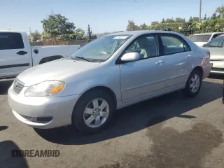 2005 Toyota Corolla CE with VIN 1NXBR30E15Z434516, listed as a Copart auction lot 60743815 with 128,544 mi miles and Salvage title. Bid and sale history available at DreamBid. Image 1.