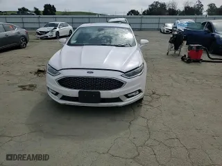 2017 Ford Fusion Energi Titanium with VIN 3FA6P0SUXHR313533, listed as a Copart auction lot 49813215 with 100,698 mi miles and Salvage Title. Bid and sale history available at carsss.com. Image 10.