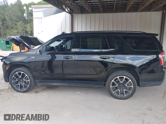 2023 Chevrolet Tahoe RST with VIN 1GNSCRKD2PR531394, listed as a IAAI auction lot 42147801 with 23,423 mi miles and . Bid and sale history available at DreamBid. Image 15.
