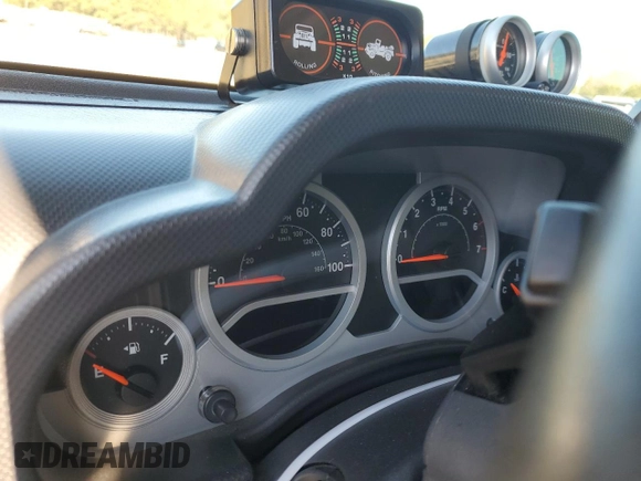 2008 Jeep Wrangler Rubicon с VIN 1J4GA64198L518646, выставлен на аукционе Copart как лот 82381084 с пробегом Не указан миль и Списание • Salvage title. История ставок и продаж доступна на DreamBid. Изображение 9.