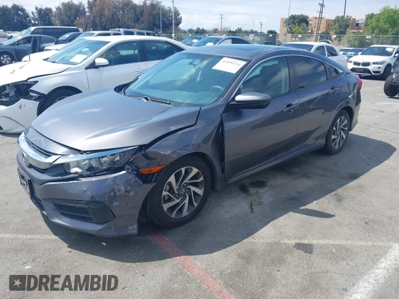 2016 Honda Civic Sedan EX with VIN 2HGFC2F7XGH526418, listed as a IAAI auction lot 41890264 with 124,620 mi miles. Bid and sale history available at carsss.com. Image 2.