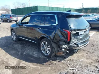 2023 Cadillac XT6 AWD Premium Luxury with VIN 1GYKPDRS8PZ153838, listed as a IAAI auction lot 41838527 with 60,034 mi miles and . Bid and sale history available at DreamBid. Image 3.