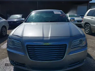 2013 Chrysler 300 C with VIN 2C3CCAEG7DH727559, listed as a IAAI auction lot 41990806 with 201,182 mi miles and . Bid and sale history available at DreamBid. Image 6.