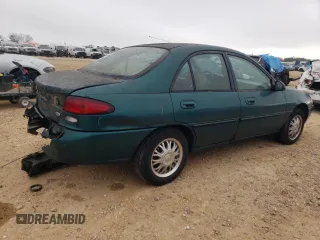 1997 Ford Escort LX with VIN 1FALP13P8VW264150, listed as a Copart auction lot 87328394 with 127,934 mi miles and Salvage Title. Bid and sale history available at carsss.com. Image 3.
