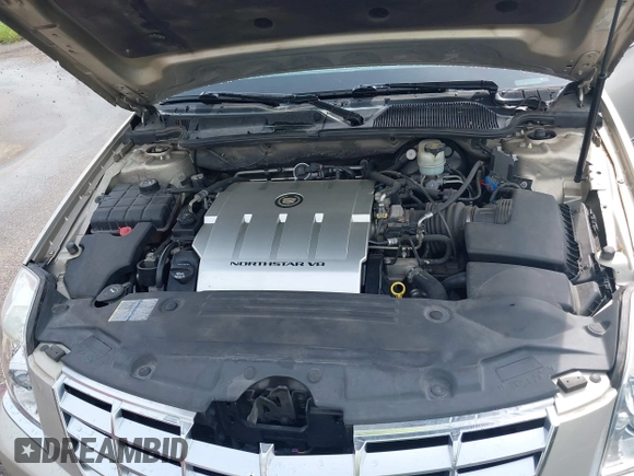 2009 Cadillac DTS 1SA z VIN 1G6KD57Y19U127449, wystawiony jako IAAI lot #42116152 z przebiegiem 107 901 mil mil oraz . Historia ofert i sprzedaży dostępna na DreamBid. Obrazek 10.