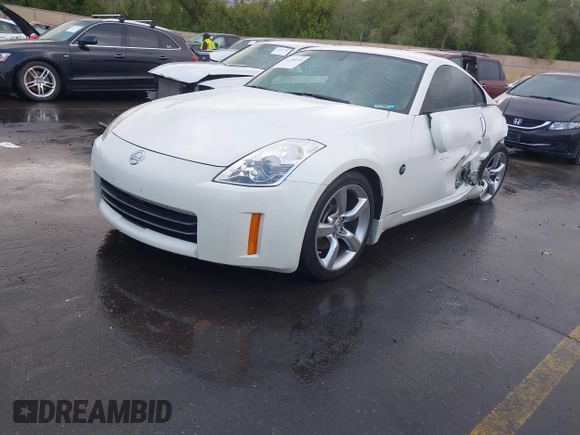 2007 Nissan 350Z Enthusiast z VIN JN1BZ34D17M501594, wystawiony jako IAAI lot #42256549 z przebiegiem Nie podano mil oraz . Historia ofert i sprzedaży dostępna na DreamBid. Obrazek 16.