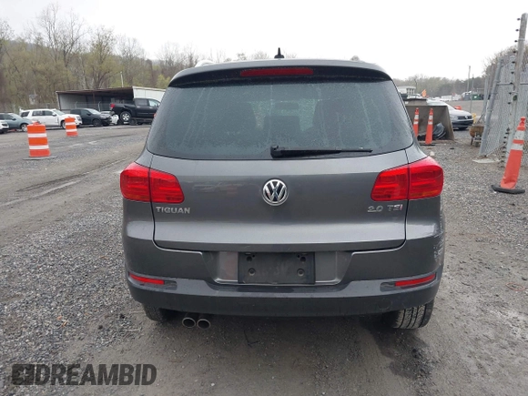2013 Volkswagen Tiguan SE with VIN WVGAV7AX9DW547633, listed as a IAAI auction lot 42009704 with 51,826 mi miles and . Bid and sale history available at DreamBid. Image 16.
