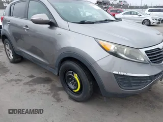 2013 Kia Sportage LX with VIN KNDPBCA23D7529658, listed as a IAAI auction lot 42473877 with 114,797 mi miles and . Bid and sale history available at DreamBid. Image 6.