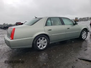 2006 Cadillac DTS 1SC z VIN 1G6KD57Y26U182388, wystawiony jako Copart lot #71929184 z przebiegiem 91 711 mil mil oraz Szkoda całkowita • Salvage title. Historia ofert i sprzedaży dostępna na DreamBid. Obrazek 3.