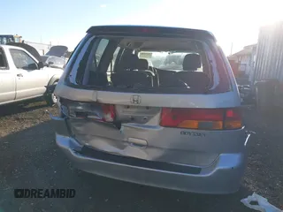 2002 Honda Odyssey EX z VIN 2HKRL18652H566576, wystawiony jako IAAI lot #40974704 z przebiegiem 232 172 mil mil oraz . Historia ofert i sprzedaży dostępna na DreamBid. Obrazek 16.