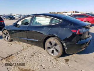 2021 Tesla Model 3 Standard Range Plus with VIN 5YJ3E1EA2MF977007, listed as a Copart auction lot 48516075 with Not Provided miles and Salvage Title. Bid and sale history available at DreamBid. Image 2.