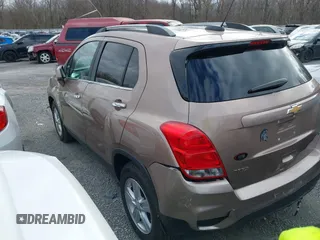 2018 Chevrolet Trax LT with VIN 3GNCJLSB8JL207404, listed as a IAAI auction lot 41796517 with 124,439 mi miles. Bid and sale history available at carsss.com. Image 3.