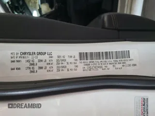 2014 Dodge Durango R/T z VIN 1C4SDJCTXEC345261, wystawiony jako Copart lot #52190285 z przebiegiem 172 035 mil mil oraz Szkoda całkowita • Salvage title. Historia ofert i sprzedaży dostępna na DreamBid. Obrazek 14.