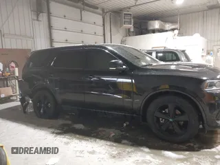 2021 Dodge Durango GT Plus with VIN 1C4RDJDG8MC688424, listed as a IAAI auction lot 41155206 with 73,935 mi miles and . Bid and sale history available at DreamBid. Image 13.