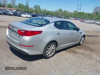 2014 Kia Optima LX with VIN 5XXGM4A72EG339998, listed as a IAAI auction lot 42132720 with 186,989 mi miles. Bid and sale history available at carsss.com. Image 4.