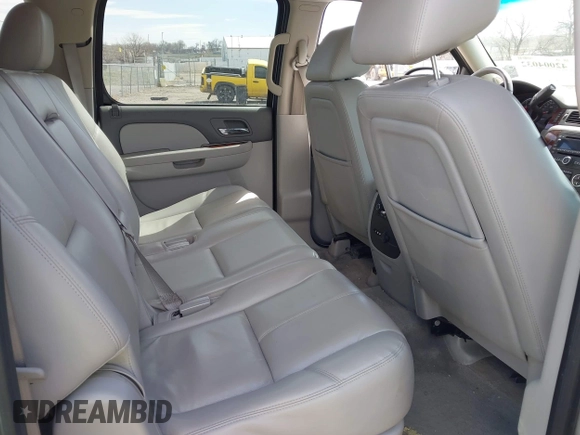 2013 Chevrolet Suburban LT with VIN 1GNSKJE78DR108955, listed as a IAAI auction lot 42004032 with 114,729 mi miles and . Bid and sale history available at DreamBid. Image 8.
