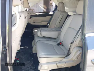 2025 Honda Odyssey Touring z VIN 5FNRL6H84SB028769, wystawiony jako IAAI lot #41856080 z przebiegiem Nie podano mil oraz . Historia ofert i sprzedaży dostępna na DreamBid. Obrazek 8.