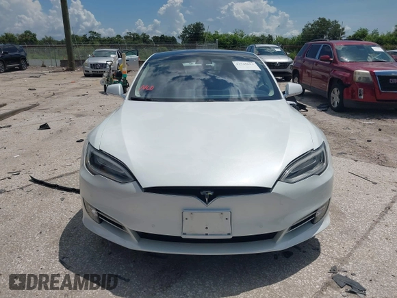 2017 Tesla Model S 100D with VIN 5YJSA1E45HF189006, listed as a IAAI auction lot 42540693 with 64,827 mi miles and . Bid and sale history available at DreamBid. Image 13.