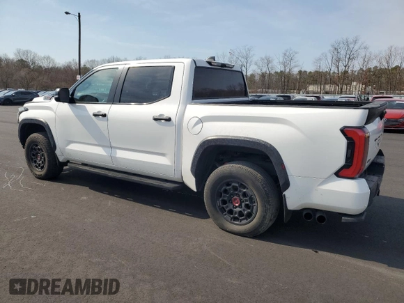 2024 Toyota Tundra TRD Pro Hybrid with VIN 5TFPC5DB7RX041471, listed as a Copart auction lot 48165595 with 23,317 mi miles and Clean title. Bid and sale history available at DreamBid. Image 2.