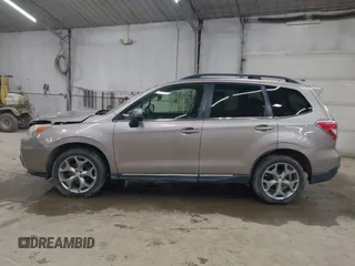 2015 Subaru Forester Touring with VIN JF2SJAUC6FH455446, listed as a IAAI auction lot 42095963 with 152,545 mi miles and . Bid and sale history available at DreamBid. Image 14.