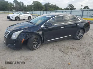 2014 Cadillac XTS with VIN 2G61L5S30E9158788, listed as a Copart auction lot 49401215 with 139,891 mi miles and Salvage Title. Bid and sale history available at carsss.com. Image 1.