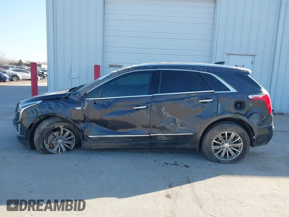 2017 Cadillac XT5 Luxury FWD with VIN 1GYKNBRS0HZ105603, listed as a IAAI auction lot 41786673 with 75,482 mi miles. Bid and sale history available at carsss.com. Image 14.