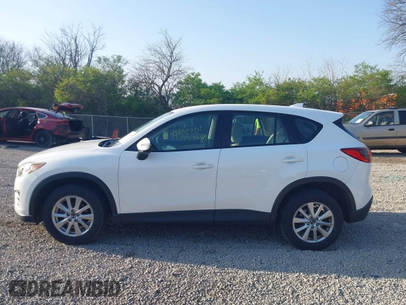 2016 Mazda CX-5 Sport with VIN JM3KE2BY2G0819604, listed as a IAAI auction lot 42059846 with 124,911 mi miles. Bid and sale history available at carsss.com. Image 14.