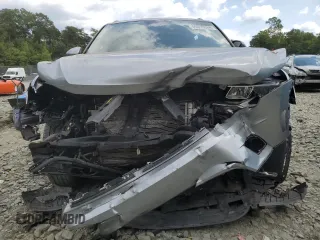 2020 Volkswagen Tiguan SE with VIN 3VV2B7AX4LM022562, listed as a Copart auction lot 69816034 with 61,789 mi miles and Salvage Title. Bid and sale history available at DreamBid. Image 5.