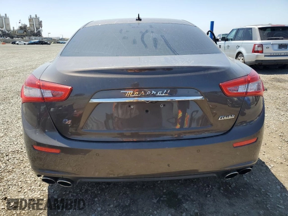 2015 Maserati Ghibli S Q4 z VIN ZAM57RTA7F1130656, wystawiony jako Copart lot #56363915 z przebiegiem 45 397 mil mil oraz Szkody całkowita. Historia ofert i sprzedaży dostępna na DreamBid. Obrazek 6.