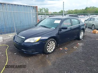 2011 Chrysler 200 Touring with VIN 1C3BC1FB6BN555155, listed as a IAAI auction lot 42086925 with 163,043 mi miles. Bid and sale history available at carsss.com. Image 2.