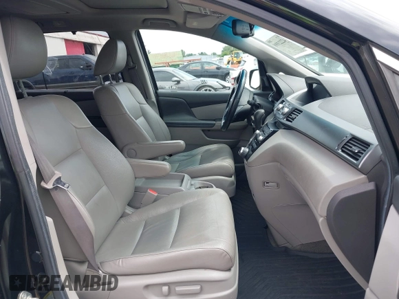 2012 Honda Odyssey Touring with VIN 5FNRL5H93CB121190, listed as a IAAI auction lot 42223998 with 154,358 mi miles and . Bid and sale history available at DreamBid. Image 5.