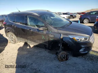 2019 Ford Escape Titanium with VIN 1FMCU9J90KUA00316, listed as a Copart auction lot 45917075 with 84,331 mi miles and Salvage Title. Bid and sale history available at carsss.com. Image 4.