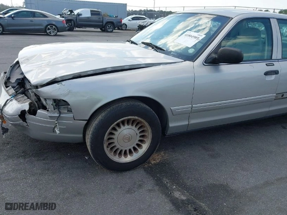 2004 Ford Crown Victoria Standard with VIN 2FAFP73W94X107561, listed as a IAAI auction lot 41804985 with 128,066 mi miles. Bid and sale history available at carsss.com. Image 14.