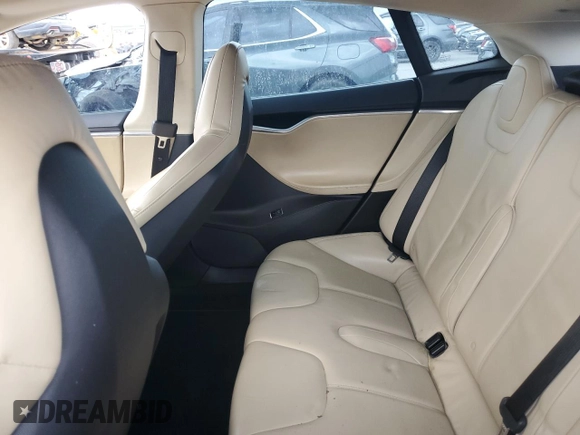 2013 Tesla Model S with VIN 5YJSA1AG7DFP12228, listed as a Copart auction lot 60040665 with 87,674 mi miles and Clean title. Bid and sale history available at DreamBid. Image 10.