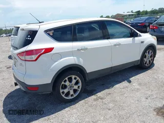 2013 Ford Escape SEL z VIN 1FMCU0H94DUD22476, wystawiony jako IAAI lot #42673808 z przebiegiem 215 811 mil mil oraz . Historia ofert i sprzedaży dostępna na DreamBid. Obrazek 4.