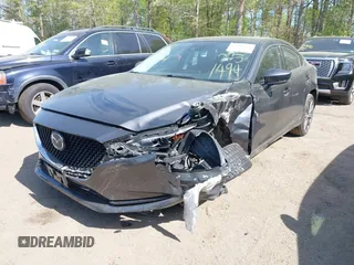 2021 Mazda 6 Grand Touring with VIN JM1GL1TY4M1600534, listed as a IAAI auction lot 42012560 with Not Provided miles. Bid and sale history available at carsss.com. Image 2.