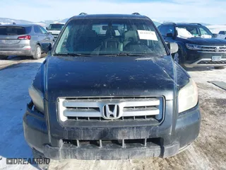 2006 Honda Pilot EX-L with VIN 2HKYF18536H526013, listed as a IAAI auction lot 41335771 with 223,265 mi miles. Bid and sale history available at carsss.com. Image 12.
